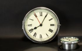 Chrome Ships Clock. Made in England, diameter 9 inches total, please see accompanying image.