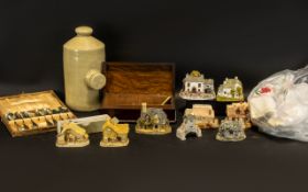 Box of Assorted Collectibles to include 8 Hermitage Collection Lilliput Lane houses, a stone water