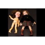 Two Armand Marseille Bisque Head Dolls, one in original Scottish attire, marked Armand Marseille,