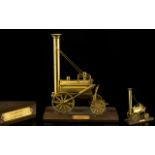 Train Interest. Scratch built model of Stephensons Rocket, made of brass on wooden plinth, 10 1/2