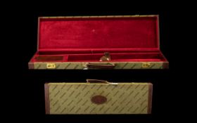 Winchester Gun Case. Canvas gun case with leather edges and leather handle, brass locks, with red