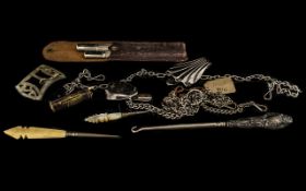 Early 20thC Travelling Knife and Fork Set each in two pieces with engine turned handles.