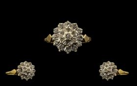 Ladies 9ct Gold Diamond Set Cluster Ring - of flower head design, fully hallmarked for 9ct.