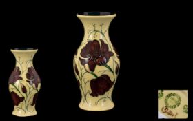 Moorcroft Modern Tubelined Vase, deep red flowered pattern on cream background date 2013. height 5''