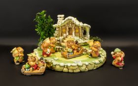 Pendelfin Christmas Cottage with Christmas Figures. Comprising sparkly Christmas cottage base and