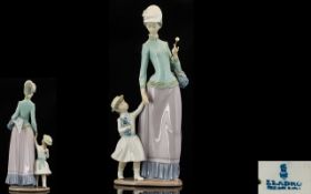 Lladro - Hand Painted Porcelain Figure ' Lady with Girl ' Model No 1353. Issued 1975 - 1985.