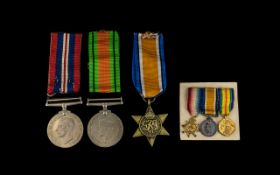 A Collection of World War Medals to include a WWI Military trio plus three others.