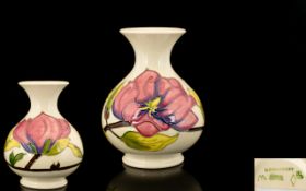 Moorcroft Tube lined Globular Shaped Vase ' Pink Magnolia ' Design on Cream Ground. c.1980's. 1st