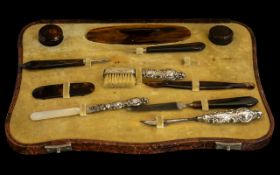Vintage Leather Manicure Case with some original contents and some unmatching additions, including