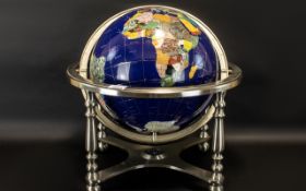 Decorative Gemstone Globe Gilt framed globe inlaid with various semi precious stones and gold tone