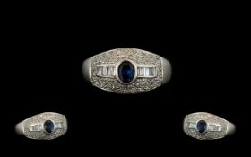 18ct White Gold - Attractive and Contemporary Dress Ring - Set with Sapphire and Diamonds.