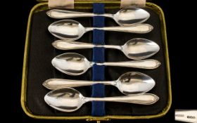 A Set of Six Silver Teaspoons all marked for Sheffield B 1944 in an associated box.