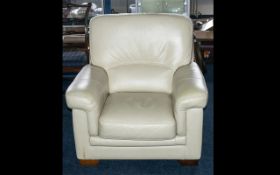 A Modern Contemporary Cream Leather Single Arm Chair.