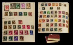 Stamp Interest - Two Old World Stamp Albums. Both in Stanley Gibbons burgundy coloured 'Devon' stamp