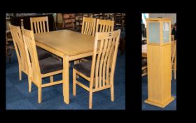 A Modern Contemporary Ash Dining Suite comprising a rectangular dining table and 6 chairs all with