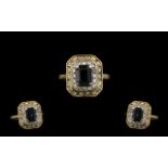 18ct Gold - Nice Quality Diamond and Sapphire Set Dress Ring of Octagonal Shape.