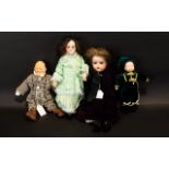 Four Various Dolls comprising two bisque headed girl dolls, a composition headed male doll and a