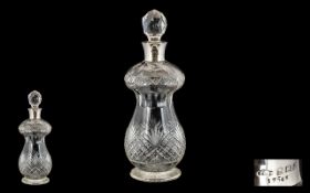Early 20th Century Nice Quality Silver Collared Cut Glass Decanter of Pleasing Form.