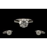 18ct White Gold - Attractive Single Stone Diamond Set Ring with Diamond Shoulders.
