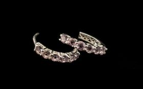 Rose de France Amethyst Hoop Earrings, a pair of small, circular hoops set with round cut Rose de