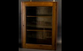 Wooden Wall Cabinet with three shelves and a glass front. 24'' x 18'', depth 8''. Please see