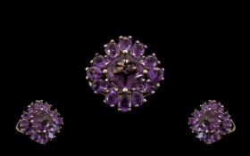 Amethyst Cluster Ring, a square cut amethyst of 2cts, set on the diagonal,