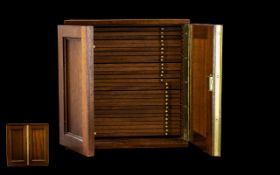 A Good Quality Teak Coin Cabinet with Fitted Interior,