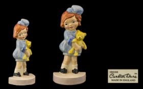 Carlton Ware - Lucie Attwell Handpainted Ceramic Figure Little Girl in Blue Dress holding a yellow