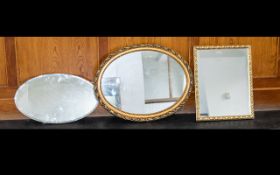 A Collection of Four Framed Mirrors, including two gilt and one 1950's mirror with bevelled glass.