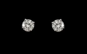 A Fine Pair of Contemporary Set Diamond Earrings In 18ct White Gold.