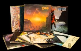 A Collection of LP Records including David Bowie, Bob Dylan, Led Zeppelin, Pink Floyd, Rolling