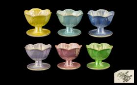 A Set of Maling Pottery Sundae Dishes in Harlequin Lustre Finish. Height 10.5cm Diameter 8.5cm.