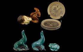 Collection of Vintage Poole Pottery to include three Poole Dolphins; a very old and rare Sea Lion