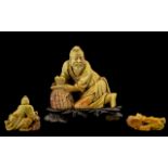 Chinese 19th Century Signed Finely Carved and Quality Hard stone Figure - of a fisherman with a