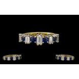 18ct Yellow Gold Attractive Baguette Cut Diamond and Sapphire Set Ring. Good design /setting.