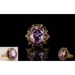 Ladies 9ct Gold Attractive Single Stone Amethyst Set Dress Ring - with open worked setting.
