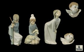 A Small Collection of Lladro Porcelain Figures ( 4 ) In Total. Comprises 1/ Girl with Nightdress. 7.