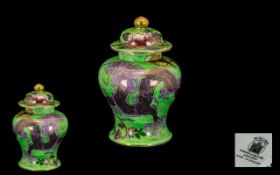 A Maling Lustre Ware Glazed Ginger Jar Decorated to the exterior with a single dragon amongst