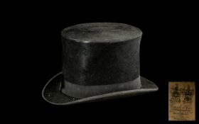 A Cash & Co Blackburn & Burnley Black Silk Top Hat in an original Hope Brothers Ludgate Hill London