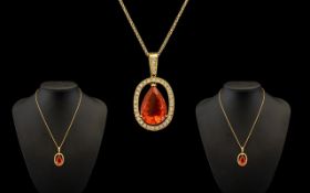 Ladies Stunning and Attractive Fire Opal and Diamond Set Pendant with Attached 18ct Gold Chain.