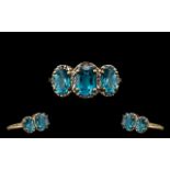 Ladies 9ct Gold Attractive 3 Stone Blue Topaz and Diamond Set Dress Ring - the blue topazes of