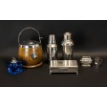 Collection of Metal Items to include two cocktail shakers in torpedo style;