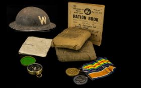 Military Interest - comprising British WW2 Military Helmet along with ration book,