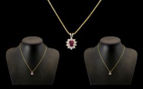 18ct White Gold Attractive Ruby and Diamond Pendant Drop in the form of a flower head attached to a