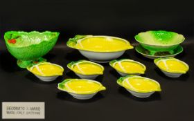 A Carlton Ware Lettuce & Tomato Salad Dish and Drainer and a triangular serving dish and stand.