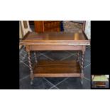 Early 20th Century Oak Trolley with swivel top with green felt card table on the reverse.