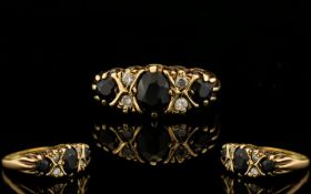 Ladies 9ct Sapphire and Diamond Dress Ring. 9ct yellow gold galley set Sapphire and diamond ring.