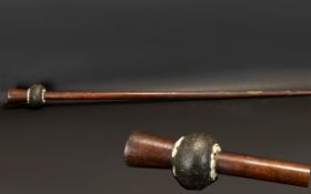 Tribal Art - An Oceanic Hardwood Club, Tapering shaft with a stone head set with small shells,