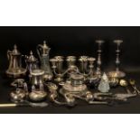 A Large Collection of Silver Plate to include candlesticks, goblets, condiments, place settings etc.