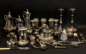 A Large Collection of Silver Plate to include candlesticks, goblets, condiments, place settings etc.